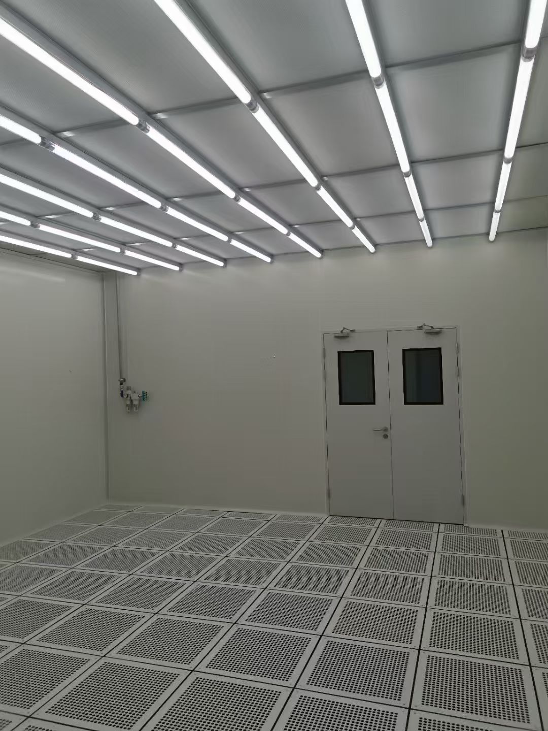 Ceiling panels, linear lighting and room layout reference